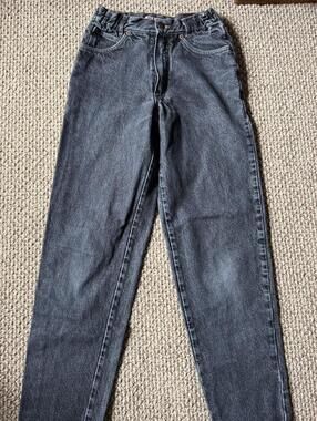 vintage dark wash faded grey / black jeans with a relaxed fit